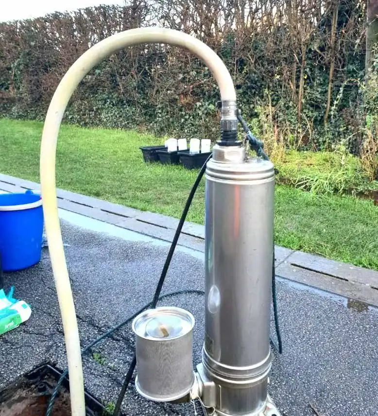 Pump and hose set up on site at a separator