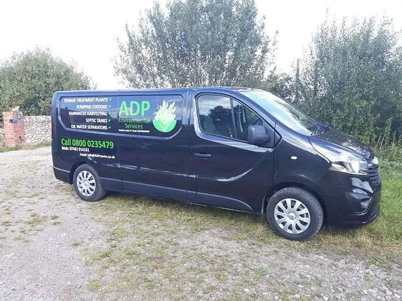An ADP Environmental Services van, with the services listed on its side